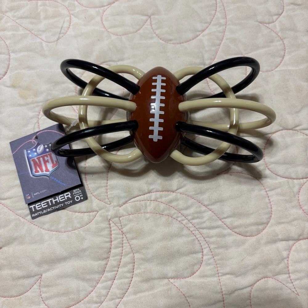 NFL Saints Football Teether/Rattle with Black and Cream Rings